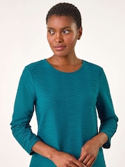 Vestido elástico texturizado romano em linha A - Imagem 4 de 5