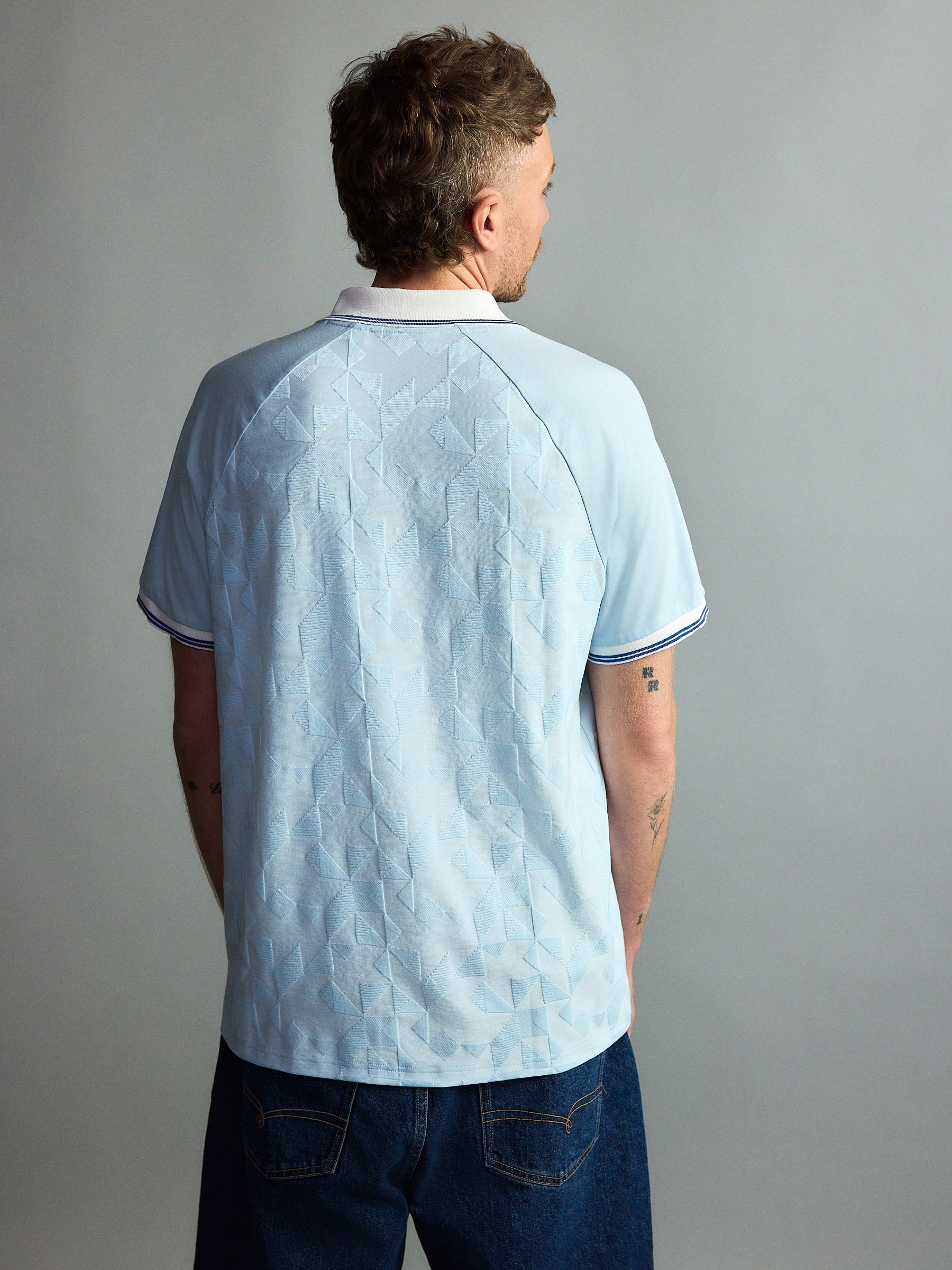 Buy Blue Graphic Football Polo Shirt from Next Romania