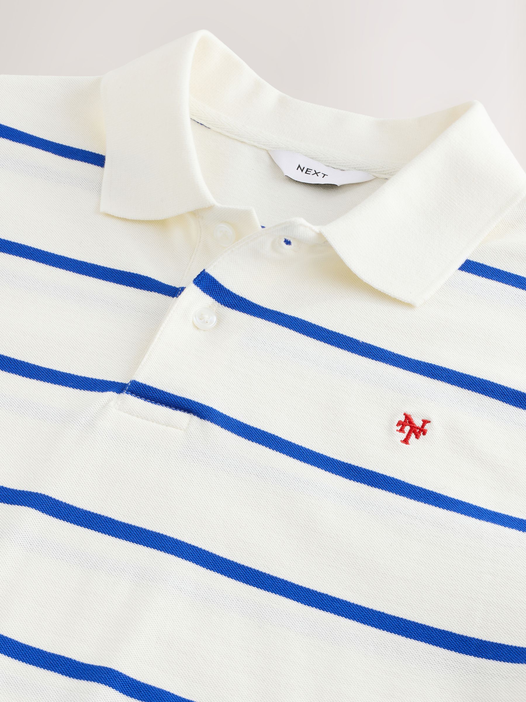 Buy White Horizontal Striped Polo Shirt from the Next UK online shop