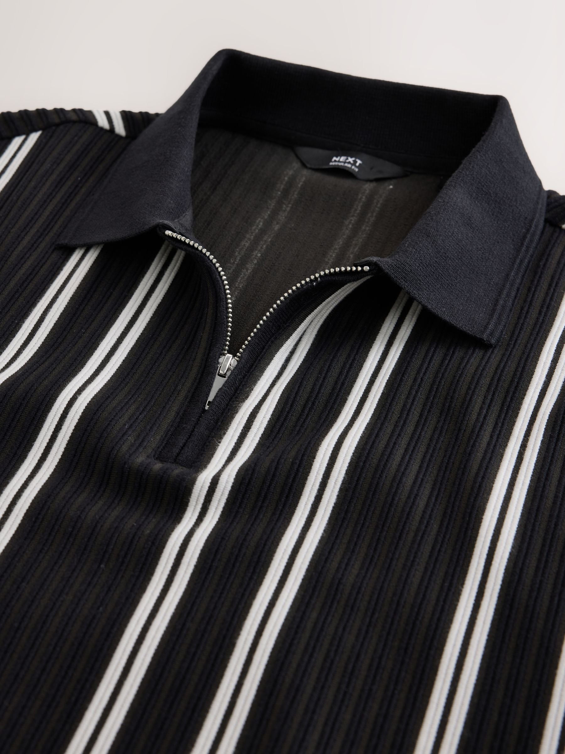 Buy Black/White Striped Textured Smart Zip Neck Polo Shirt from