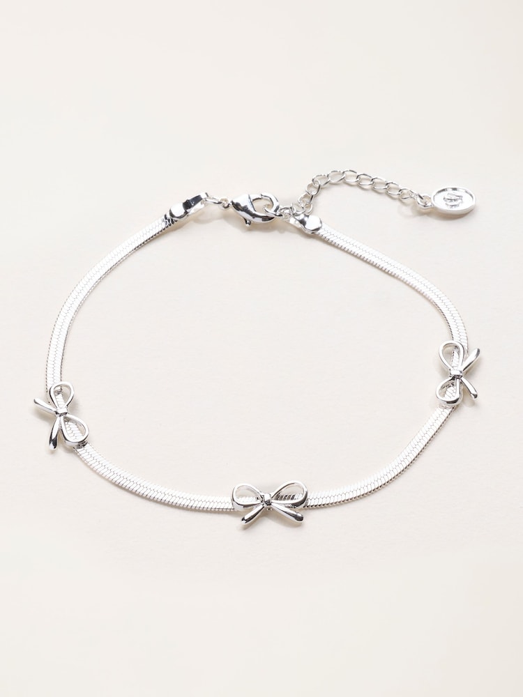 FatFace Silver Tone Bow Bracelet - Image 1 of 5 FatFace Silver Tone Bow Bracelet - Image 1 of 5