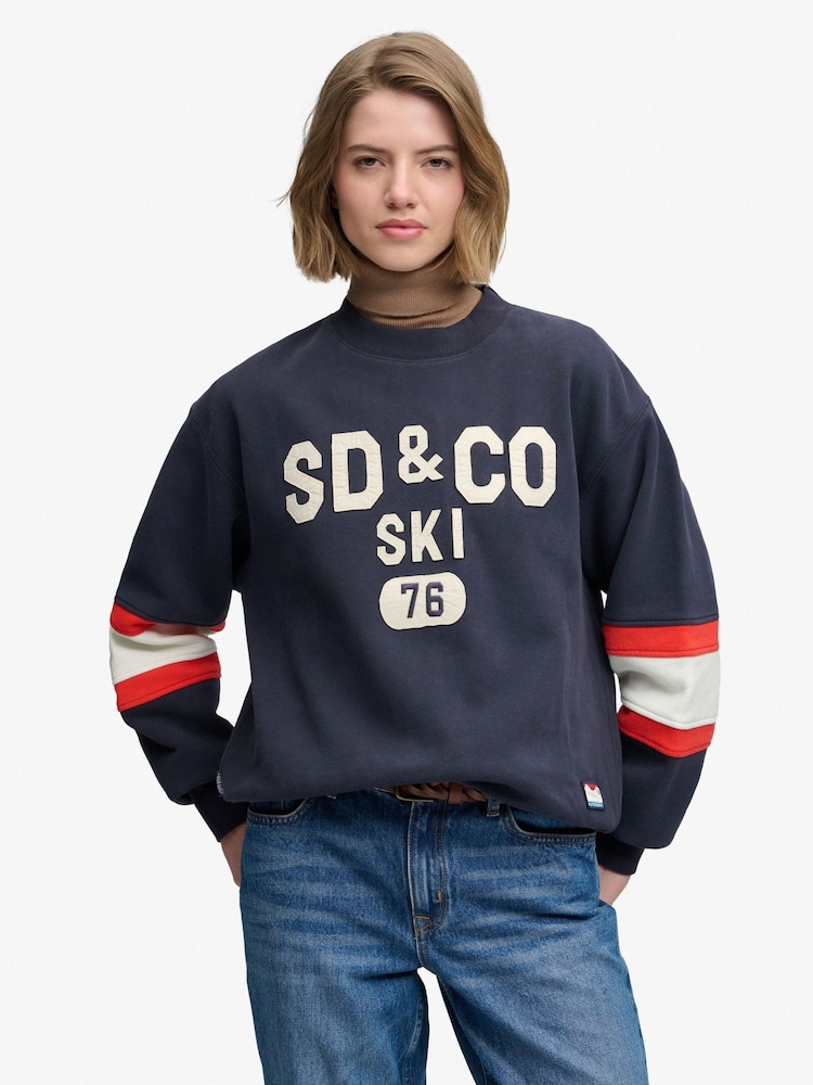 Superdry Navy Blue Preppy Ski Sweatshirt - Image 1 of 7 Superdry Navy Blue Preppy Ski Sweatshirt - Image 1 of 7