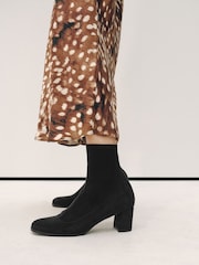 Black Forever Comfort® Round Toe Sock Ankle Boots - Image 1 of 4