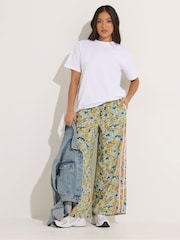 PixieGirl Petite Green Ditsy Wide Leg Side Stripe Trousers - Image 1 of 6