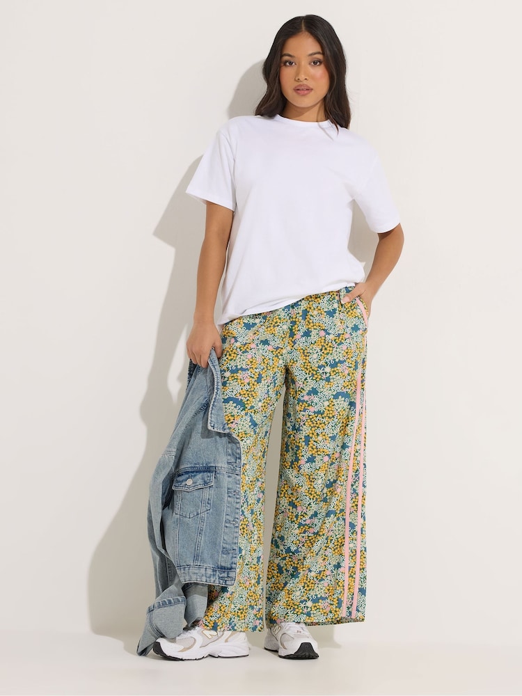 PixieGirl Petite Green Ditsy Wide Leg Side Stripe Trousers - Image 1 of 6 PixieGirl Petite Green Ditsy Wide Leg Side Stripe Trousers - Image 1 of 6
