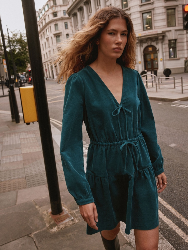 Teal Blue Long Sleeve V-Neck Tie Cord Mini Dress - Image 1 of 9 Teal Blue Long Sleeve V-Neck Tie Cord Mini Dress - Image 1 of 9