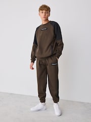 Baker by Ted Baker Överdimensionerad brun/svart nylontröja och joggingset - Bild 1 av 6