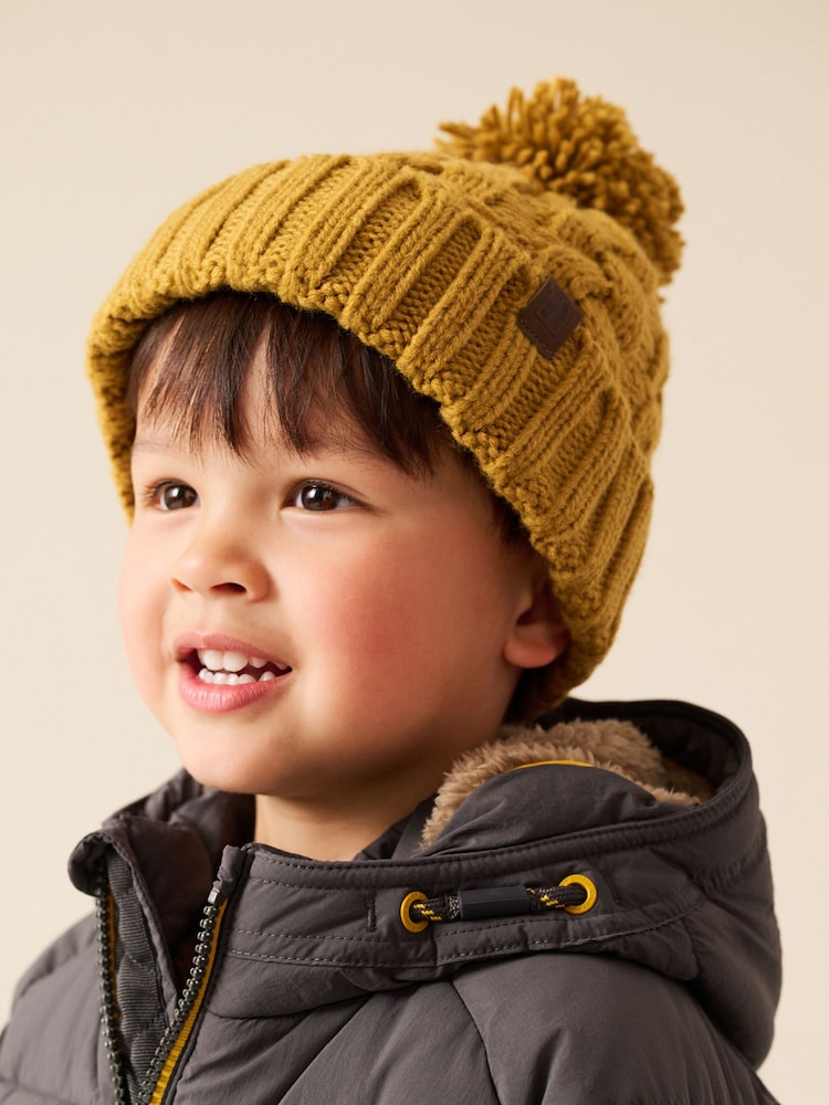 Ochre Yellow Cable Knit Pom Hat (1-16yrs) - Image 1 of 6 Ochre Yellow Cable Knit Pom Hat (1-16yrs) - Image 1 of 6