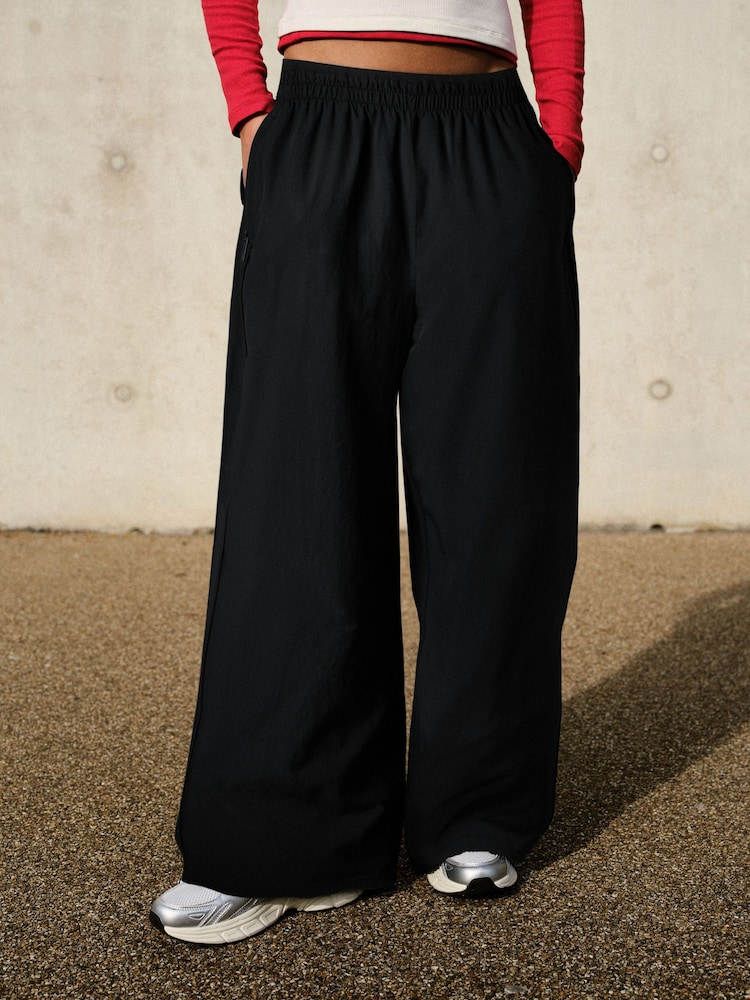 self. Black 4 Way Stretch Wide Joggers - Image 1 of 8
