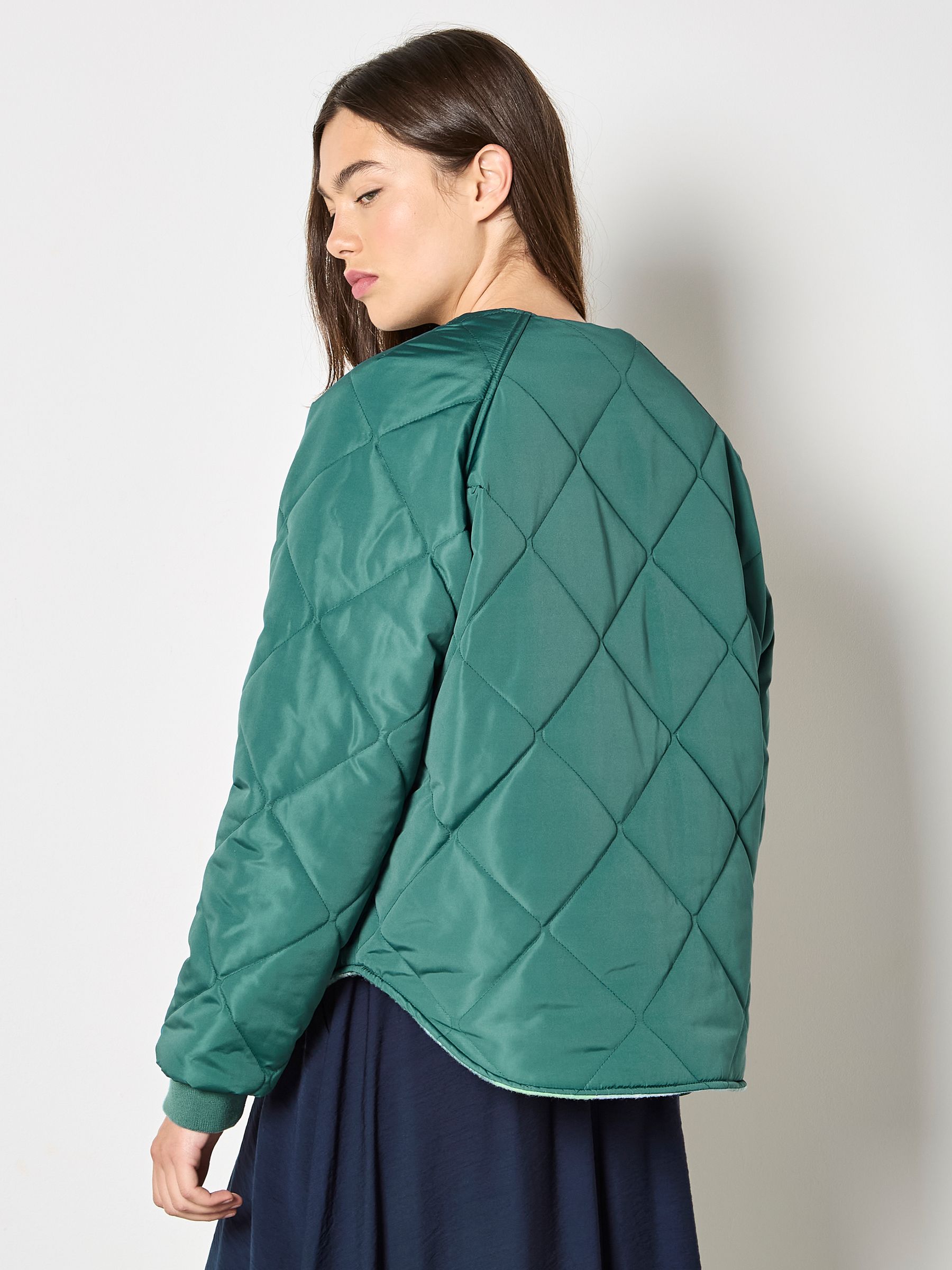 Buy Apricot Green Reversible Check Fleece Quilted Jacket from the Buy Apricot Green Reversible Check Fleece Quilted Jacket from the
