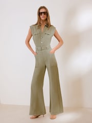 Friends Like These Olive Green Petite Sleeveless Belted Denim Utility Jumpsuit - Image 1 of 4