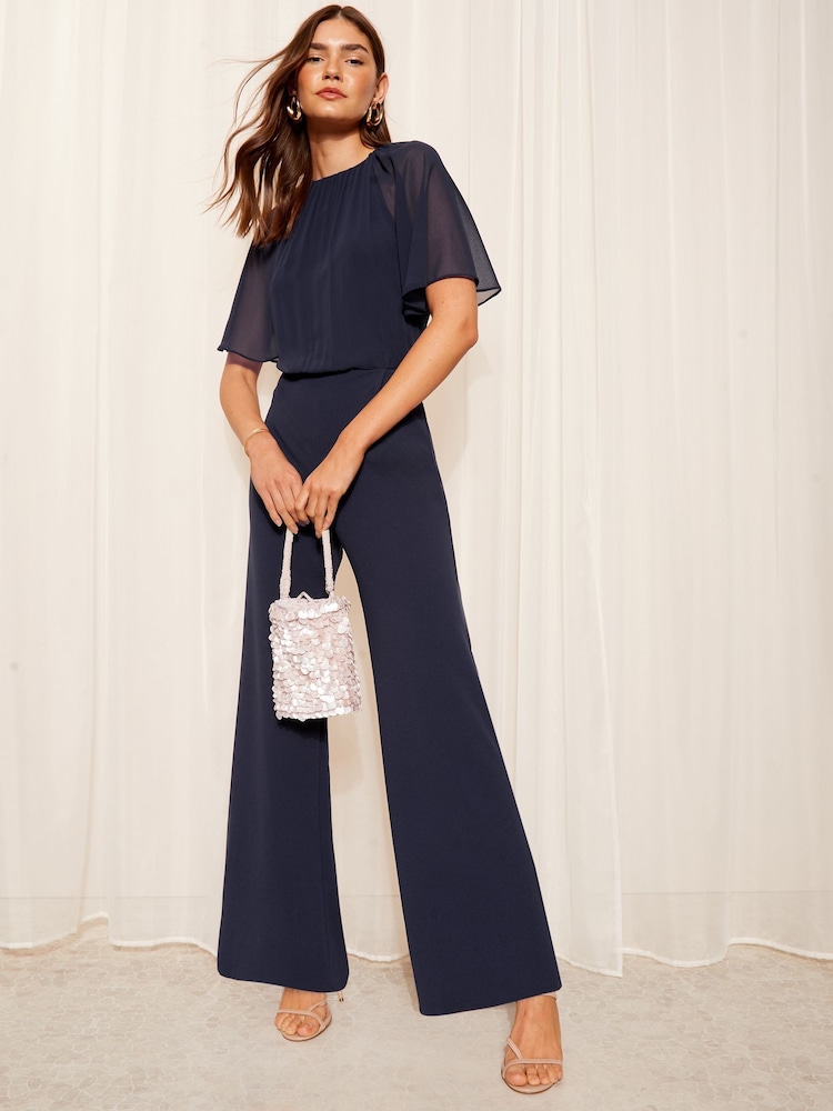 Friends Like These Navy Tall Chiffon Flutter Sleeve Jumpsuit - Image 1 of 4