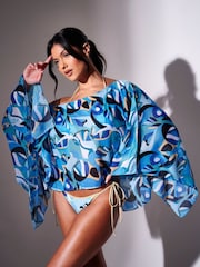 Azul - Poncho transparente con estampado de remolinos de South Beach para la playa. - Imagen 5 de 6