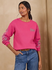 Love & Roses Pink Cheetah Sleeve Jersey Sweatshirt - Image 1 of 4