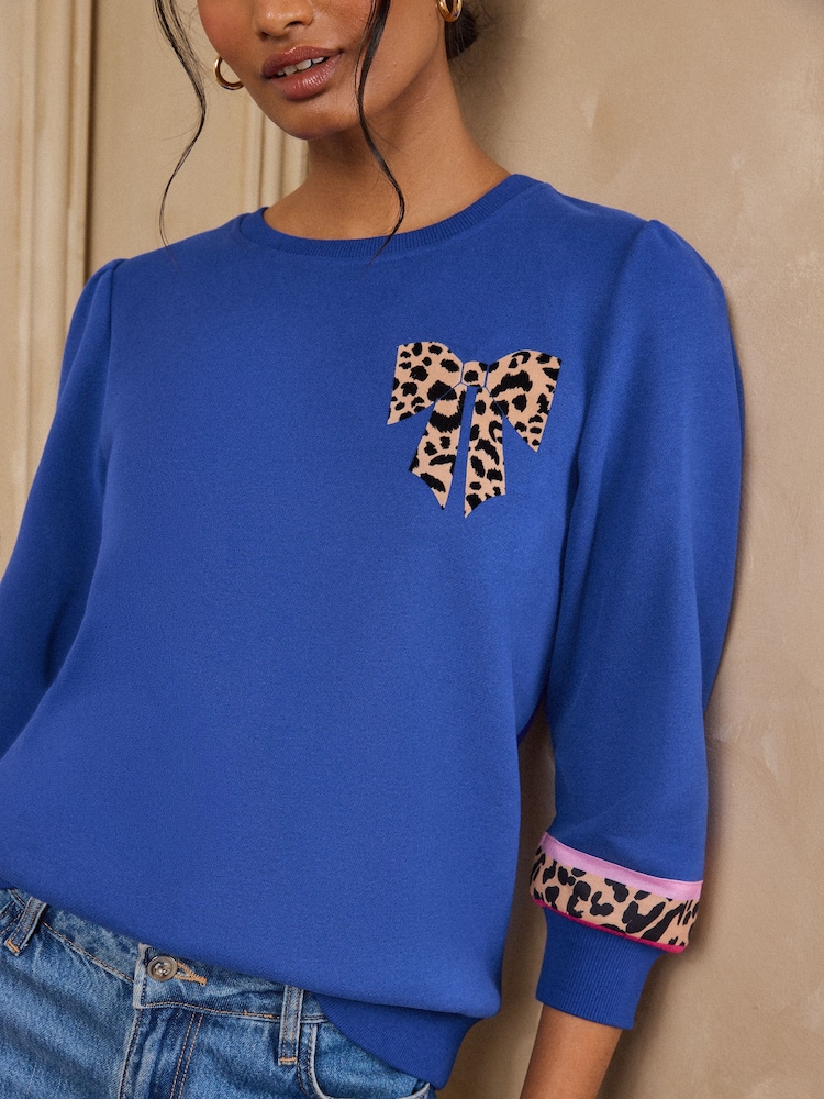 Love & Roses Cobalt Blue 3/4 Sleeve Bow Tipped Sweatshirt - Image 2 of 4