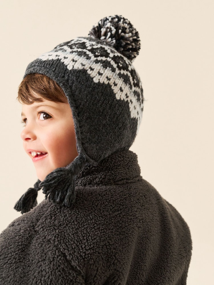 Black/ White Fairisle Pom Knitted Beanie Hat (3mths-13yrs) - Image 1 of 10 Black/ White Fairisle Pom Knitted Beanie Hat (3mths-13yrs) - Image 1 of 10
