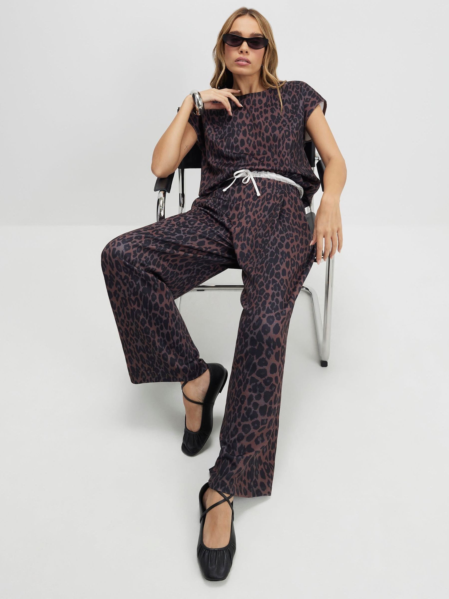 Buy River Island Black Leopard Animal Print Wide Leg Trousers from