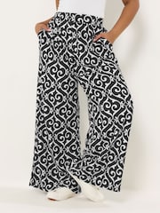 Yours Curve Black Abstract Print Trousers - Image 1 of 5