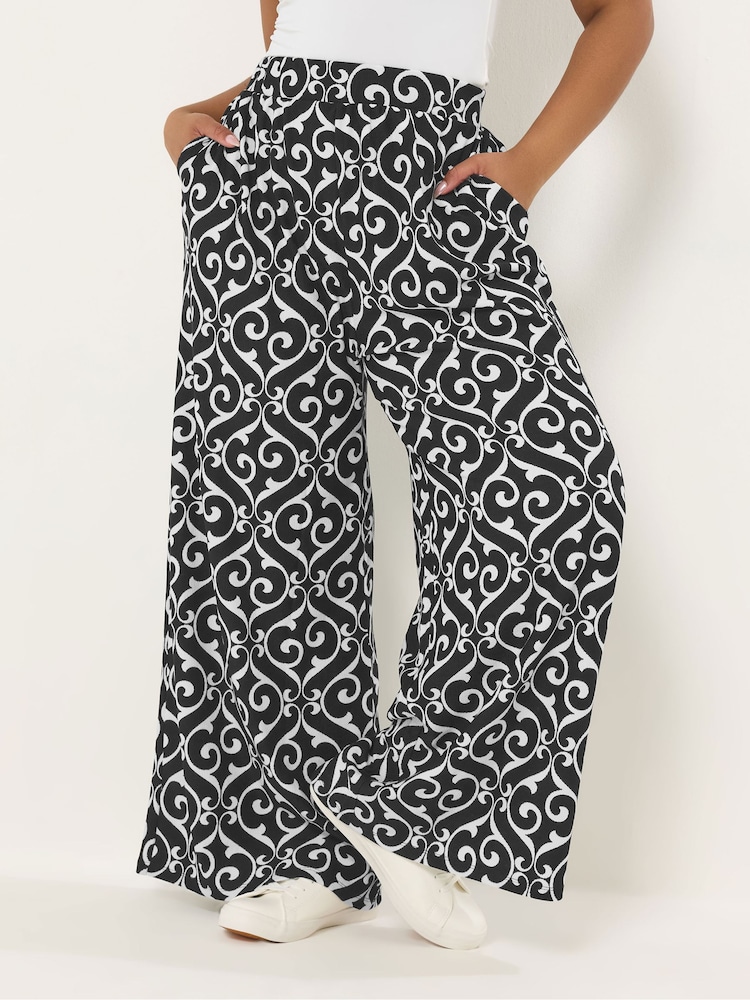 Yours Curve Black Abstract Print Trousers - Image 1 of 5