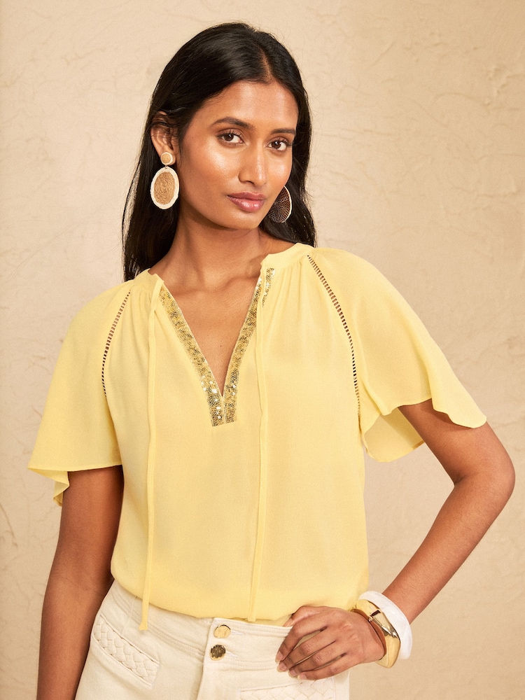 Love & Roses Pale Yellow Sequin Trim V-Neck Short Sleeve Blouse - Image 1 of 4