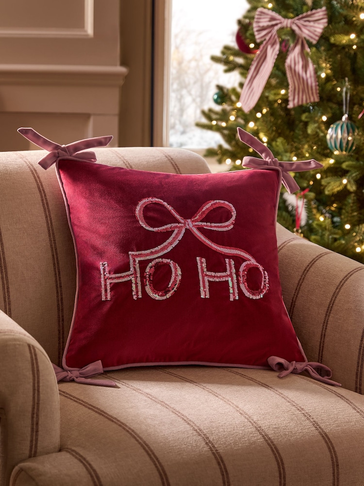 Red Christmas Bow Ho Ho Slogan Cushion - Image 1 of 4 Red Christmas Bow Ho Ho Slogan Cushion - Image 1 of 4
