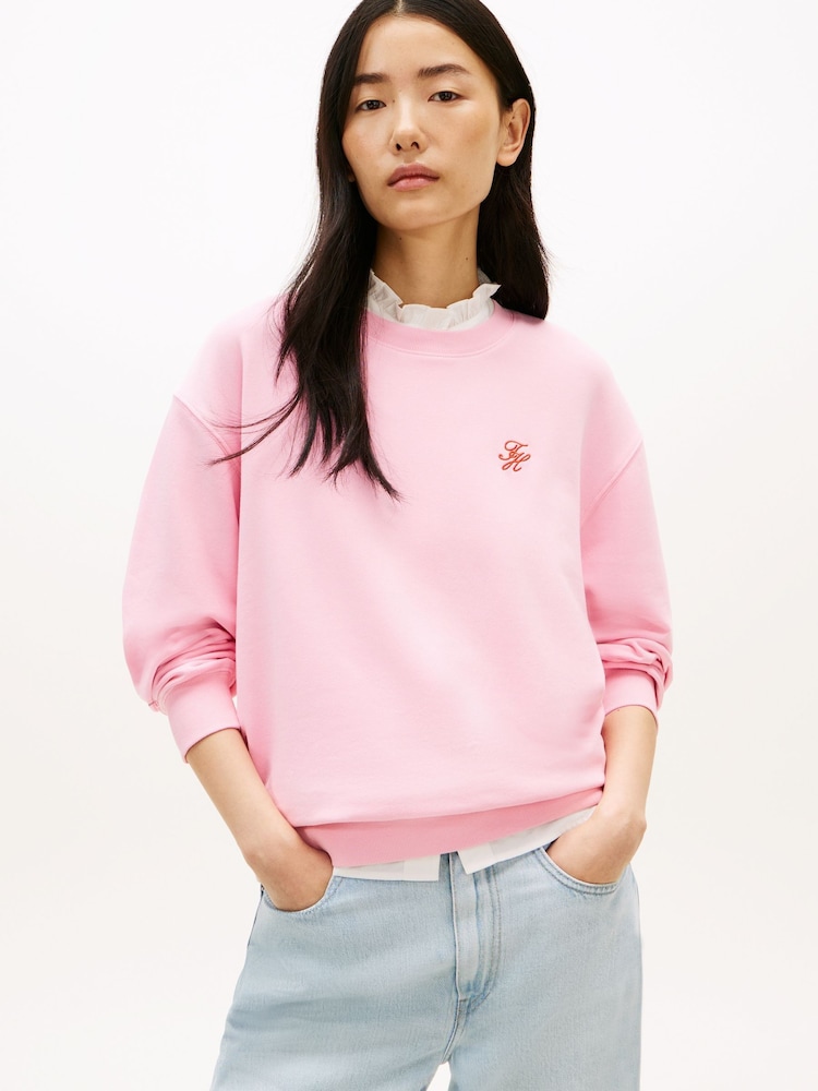 Tommy Hilfiger Pink Logo Embroidery Crew Neck Sweat Top - Image 1 of 5 Tommy Hilfiger Pink Logo Embroidery Crew Neck Sweat Top - Image 1 of 5
