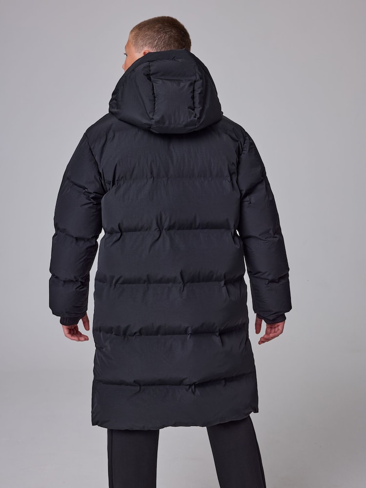 smALLSAINTS Black Longline Underground Logo Padded Coat - Image 2 of 7 smALLSAINTS Black Longline Underground Logo Padded Coat - Image 2 of 7
