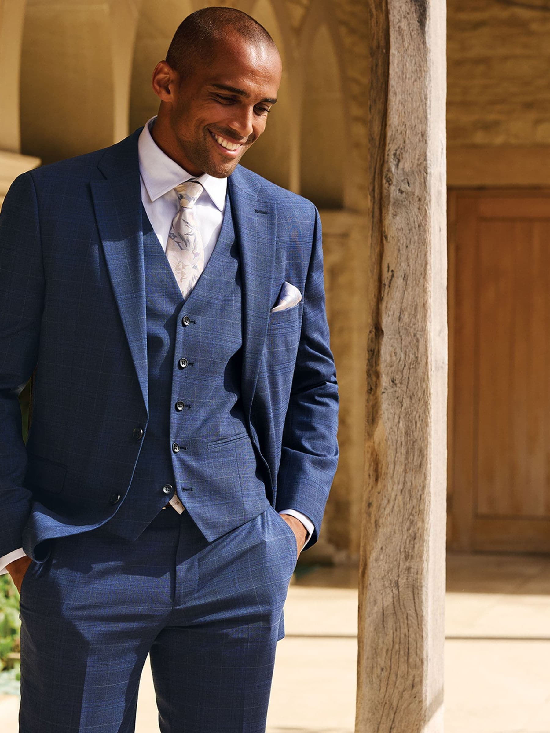 Buy Brook Taverner Blue Check Wool Blend Suit Jacket from the Next