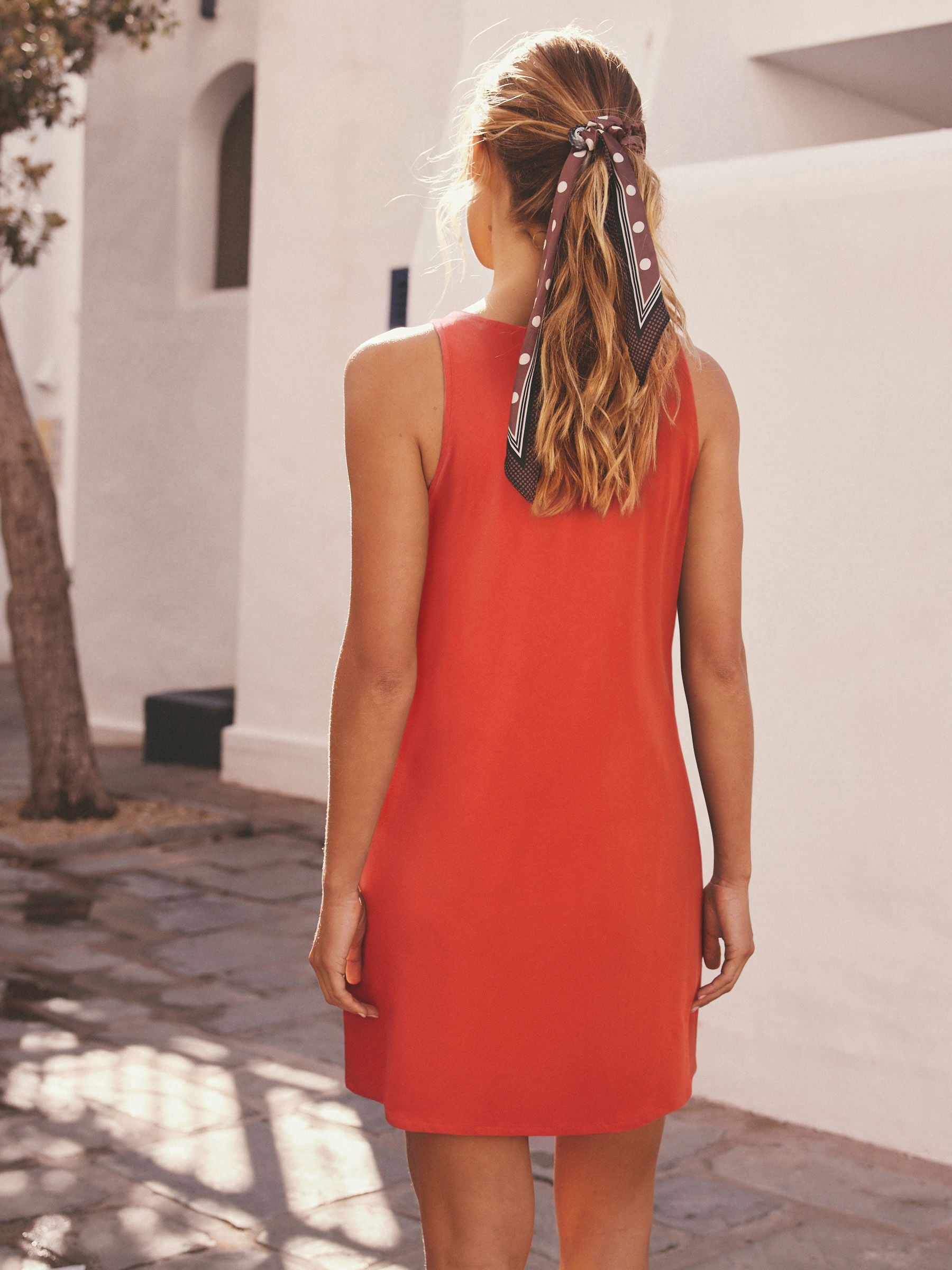 orange and black jersey dress Cara Cara