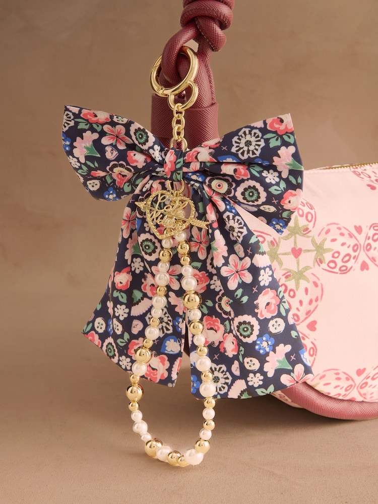 Cath Kidston Gold Tone Pearly Queen Ditsy Floral Bow Bag Charm - Image 1 of 3 Cath Kidston Gold Tone Pearly Queen Ditsy Floral Bow Bag Charm - Image 1 of 3