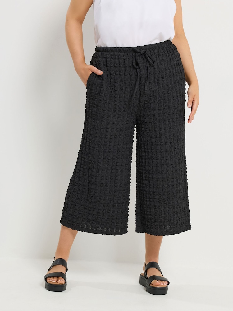 Yours Curve Black Bubble Textured Cropped Trousers - Image 1 of 5