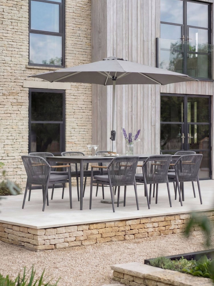 Bramblecrest Anthracite Antibes Rectangle Dining Table with 8 Chairs and Parasol - Image 1 of 6