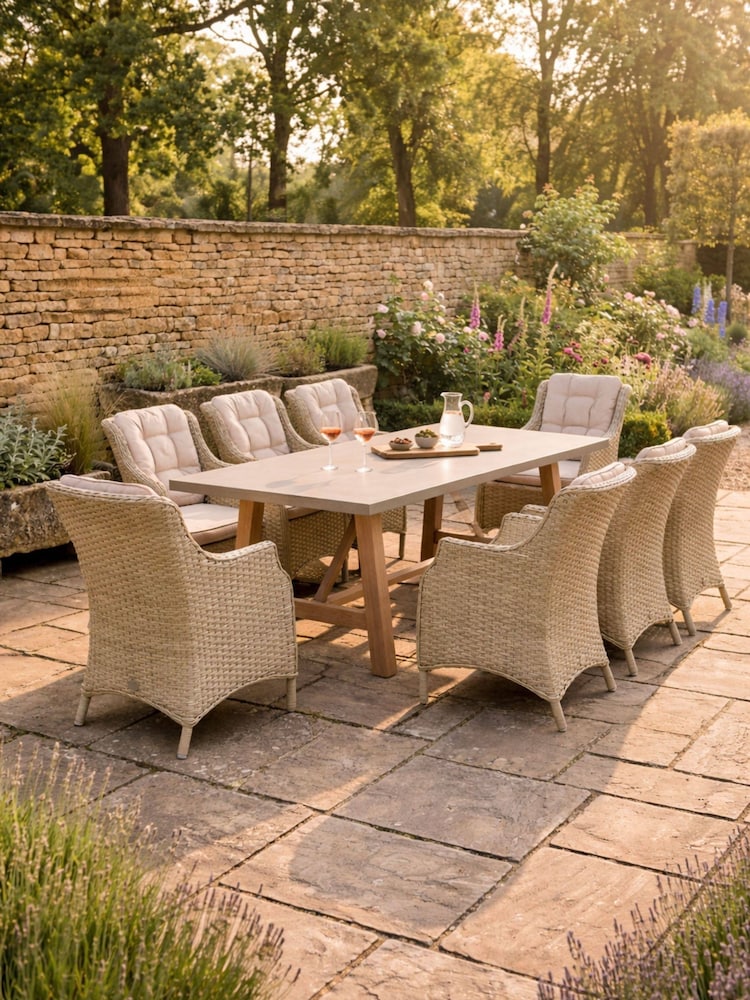 Bramblecrest Sandstone Woodchester Rectangle Table with 8 Dining Armchair and Parasol - Image 1 of 5