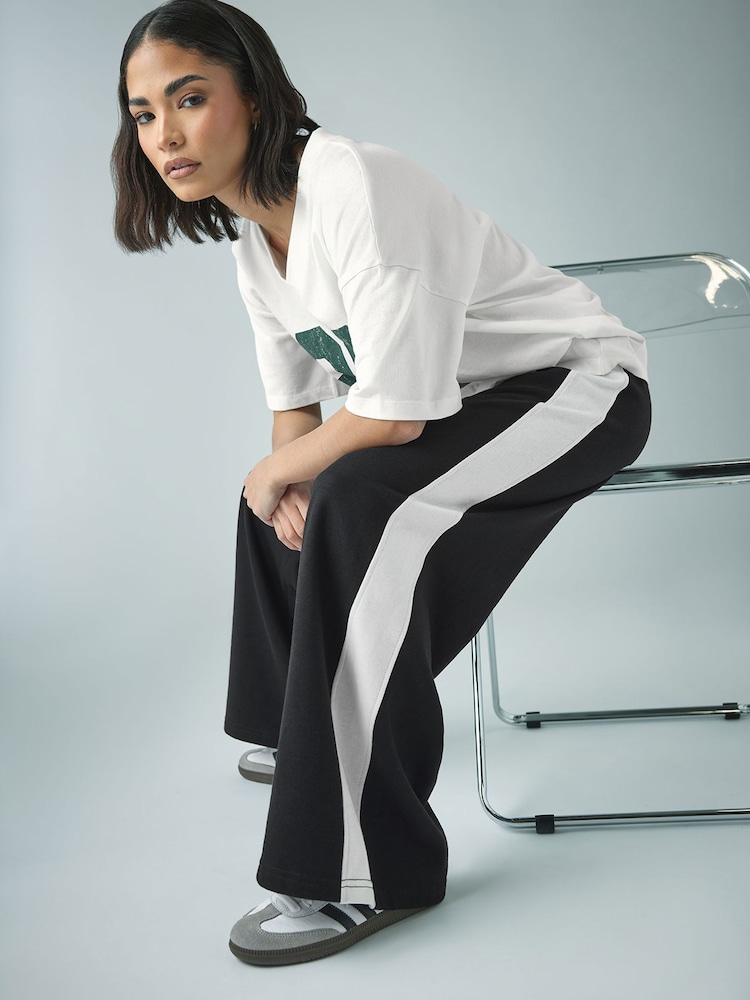 PixieGirl Petite Black Side Striped Wide Leg Joggers - Image 1 of 1