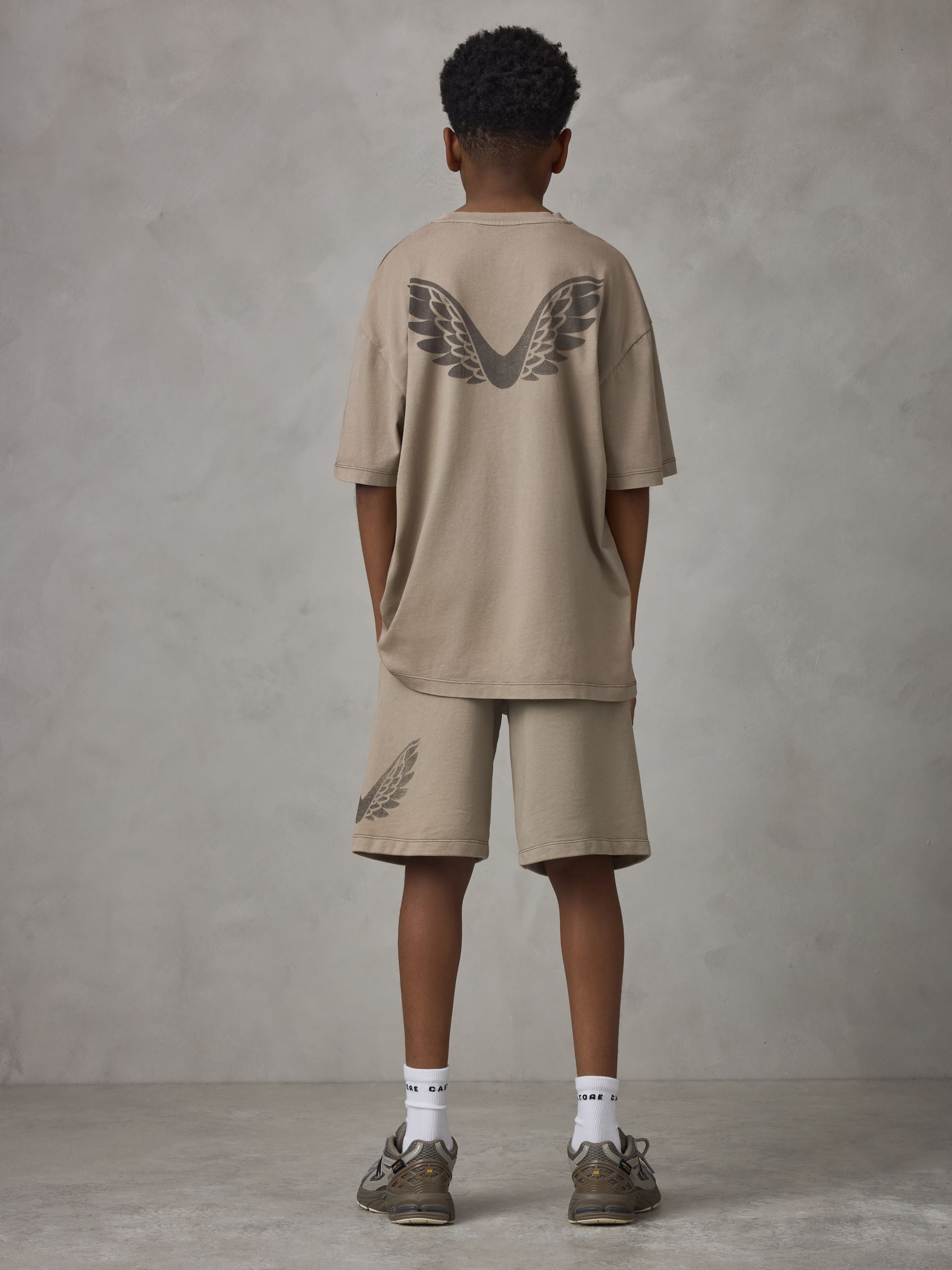 Buy Castore Stone Oversized Top and Shorts Set from the Next UK