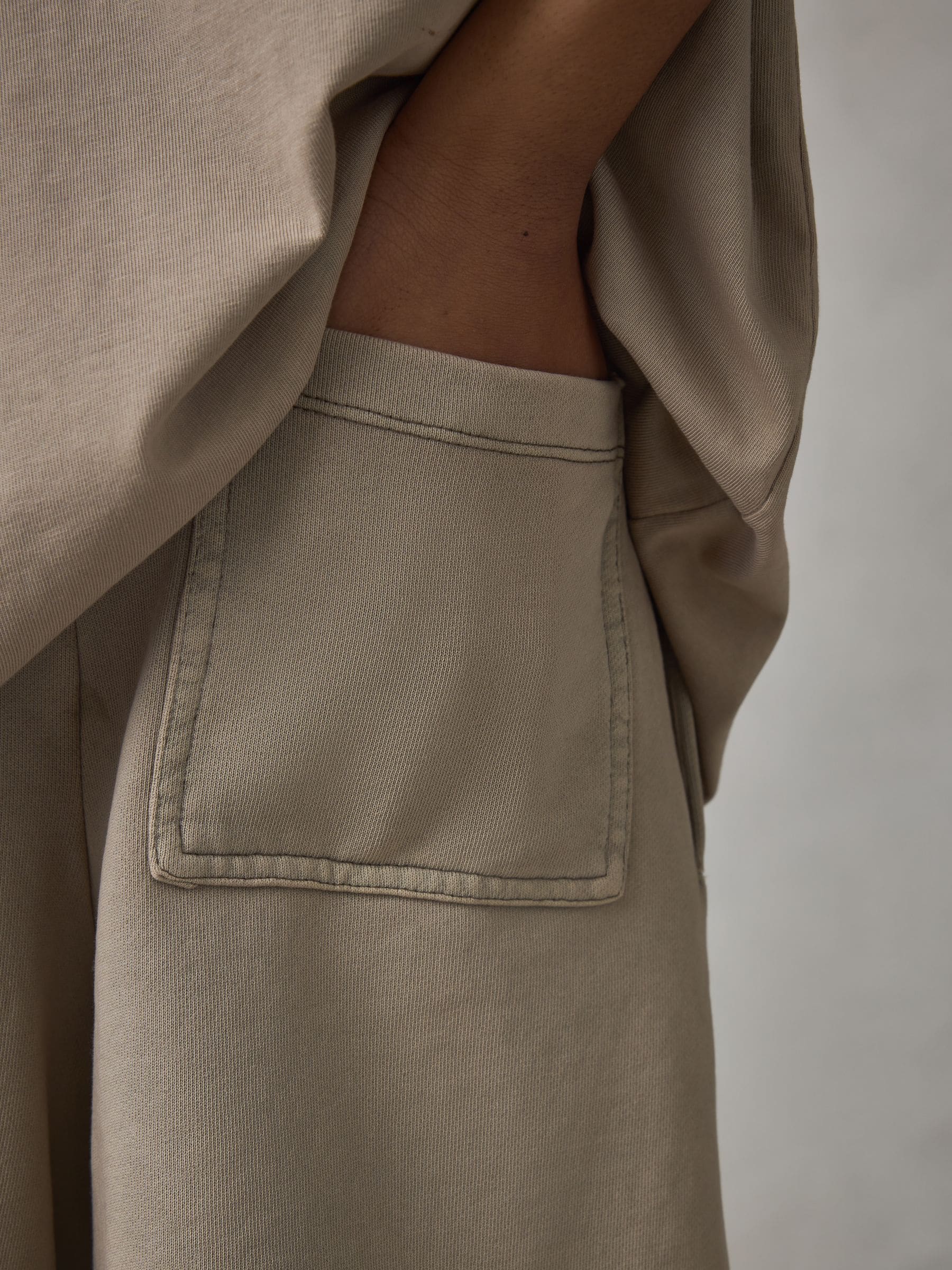 Buy Castore Stone Oversized Top and Shorts Set from the Next UK
