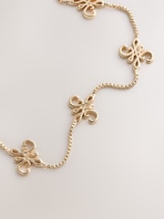 لون ذهبي - سوار Pully بتصميم Monogram - صورة 2 من 3