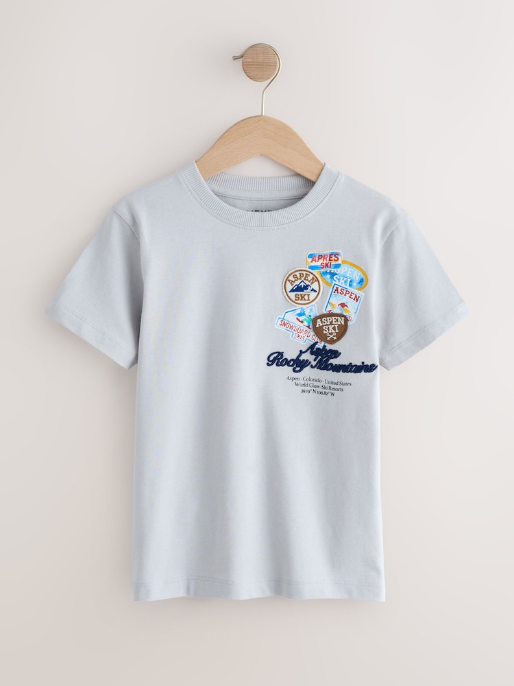Grey Ski Badge Relaxed Fit Short Sleeve Graphic T-Shirt (3-16yrs) - Image 1 of 4 Grey Ski Badge Relaxed Fit Short Sleeve Graphic T-Shirt (3-16yrs) - Image 1 of 4
