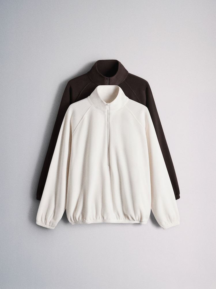 The Set 2 Pack Funnel Neck Micro Fleece Zip Jumpers Brown/Cream - Image 1 of 10 The Set 2 Pack Funnel Neck Micro Fleece Zip Jumpers Brown/Cream - Image 1 of 10