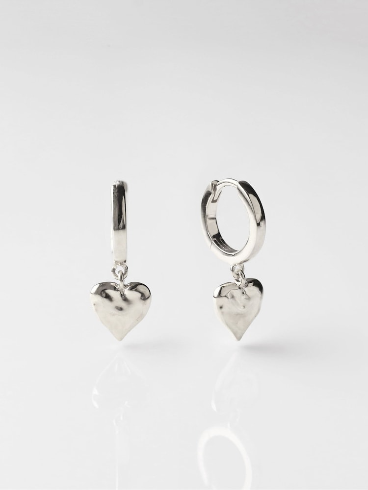 Carrie Elizabeth Silver Tone Loveheart Drop Huggie Hoops - Image 1 of 3