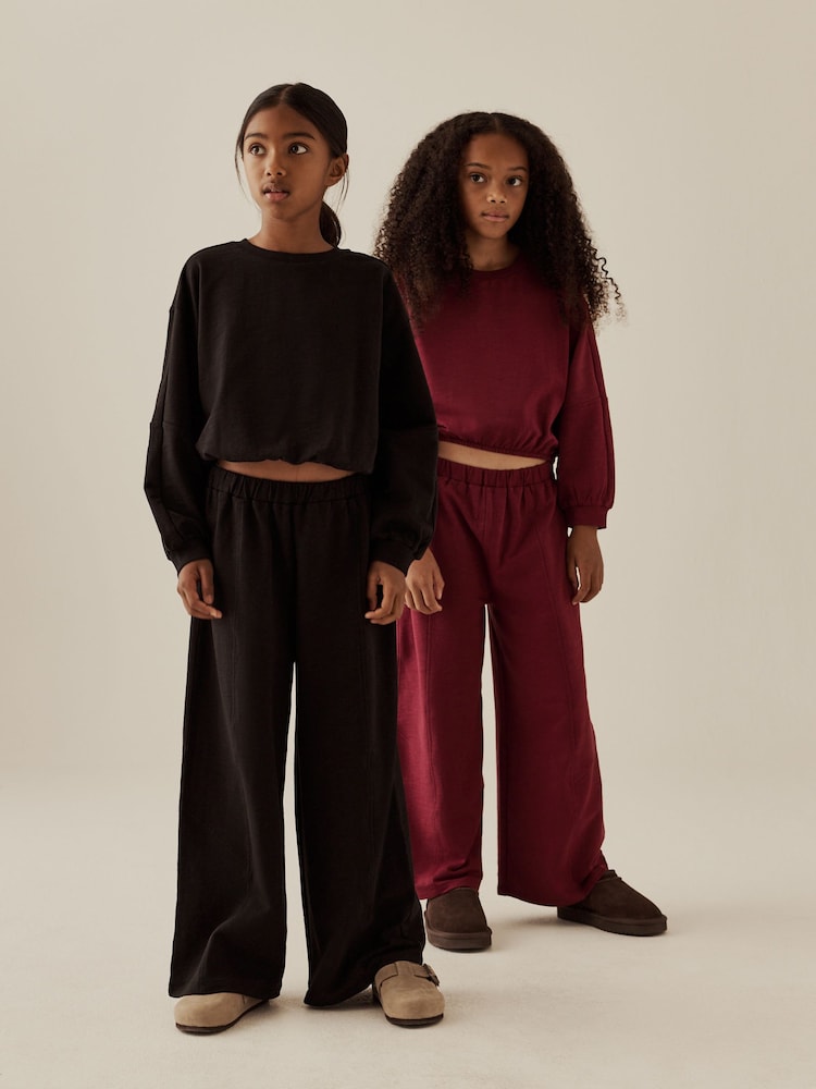 Black/Berry Long Sleeve and Wide Leg Top & Joggers Set 2 Pack (3-16yrs) - Image 1 of 6 Black/Berry Long Sleeve and Wide Leg Top & Joggers Set 2 Pack (3-16yrs) - Image 1 of 6
