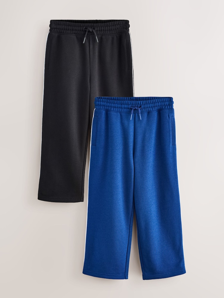Blue/Black Wide Fit Joggers 2 Pack (3-16yrs) - Image 1 of 6 Blue/Black Wide Fit Joggers 2 Pack (3-16yrs) - Image 1 of 6