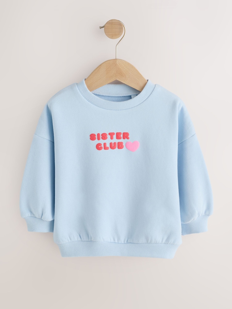 Light Blue Sister Club Crew Neck Sweatshirt (3mths-7yrs) - Image 1 of 5 Light Blue Sister Club Crew Neck Sweatshirt (3mths-7yrs) - Image 1 of 5