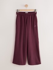 self. Burgundy Red Side Stripe Wide Leg Joggers - Image 1 of 3