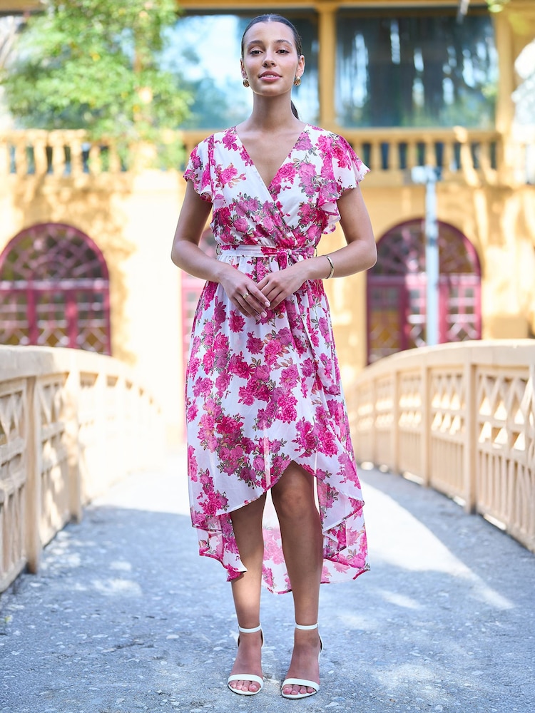 فستان ملفوف زهور بحاشية أطول من الخلف من Yumi - Image 1 of 5