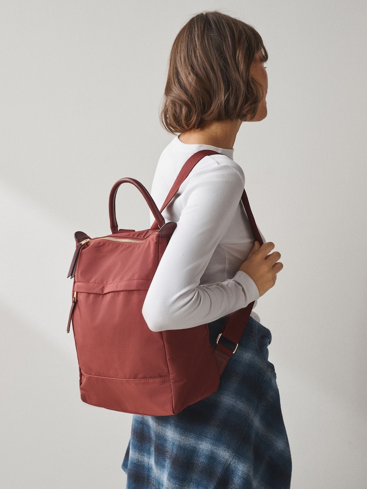 Baurgundy Red Nylon Front Pocket Rucksack - Image 1 of 4 Baurgundy Red Nylon Front Pocket Rucksack - Image 1 of 4