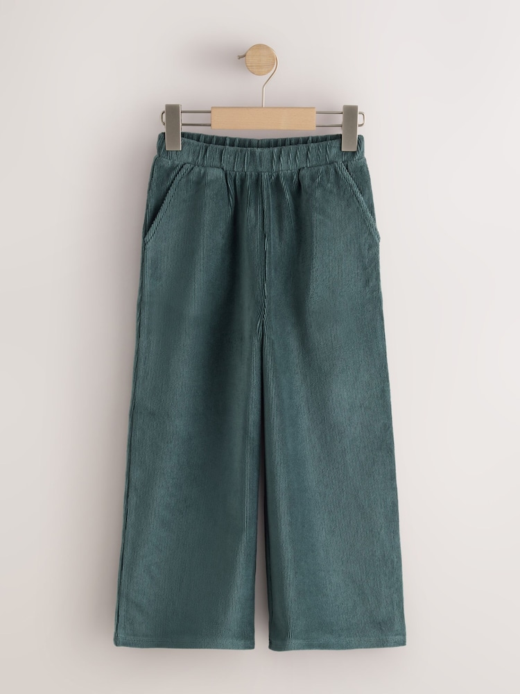 Dunkelgrün - Jersey-Cordhose mit weitem Bein (3–16 Jahre) - Bild 1 von 4