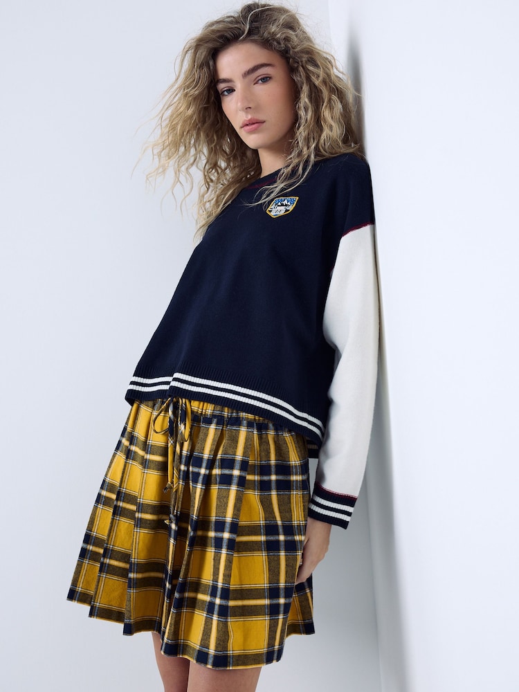 Yellow/Black Check - សំពត់ខ្លីបត់បាន - រូបភាព 1 នៃ 5 Yellow/Black Check - សំពត់ខ្លីបត់បាន - រូបភាព 1 នៃ 5