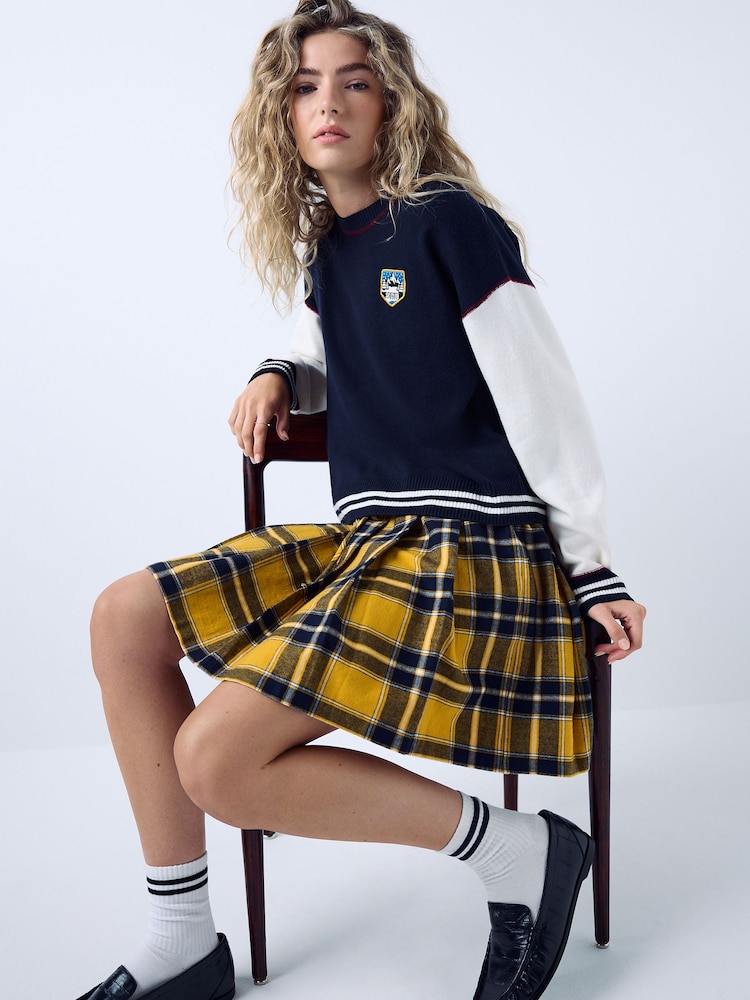 Yellow/Black Check - សំពត់ខ្លីបត់បាន - រូបភាព 2 នៃ 5 Yellow/Black Check - សំពត់ខ្លីបត់បាន - រូបភាព 2 នៃ 5