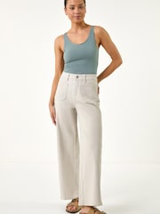 لون طبيعي - بنطلون دينم قطني مطاطي بجيوب للأحجام الصغيرة من Roman - صورة 2 من 5